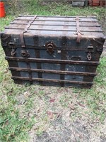 Flattop antique shipping trunk, approximately 3