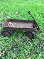 Wagon as is rusted out on bottom.