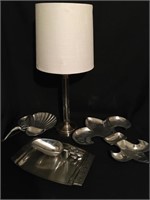 Lamp and silver plated home decor pieces.