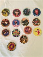 Assortment of 13 power ranger pogs And one