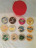 Hawaiian Pog’s, total of 12 with a plastic Pog