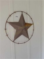 Star in barbed wire circle
