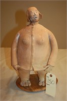 Chinese Mud Doll statue by Chinese artist