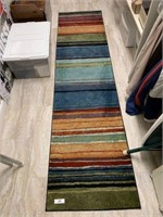 Three Matching Multi-Colored Rugs