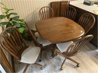Dinette Table & 6 Rolling Chairs