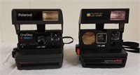 2 Polaroid cameras