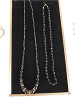 2 Black faceted beaded necklaces