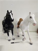 Pair of large plastic horses