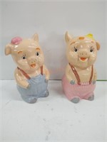 Pair of vintage piggy banks boy and girl