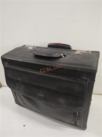 Leather rolling brief case with combination lock