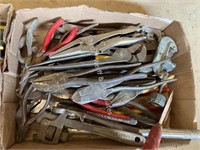 Pliers, vise grips, and screw drivers