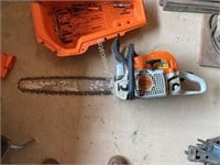 Stihl MS311 chain saw, with spare chains and oil