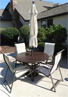 Lot #4829 - Patio table four chairs and umbrella