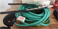 Lot #4868 - (2) Garden hoses (1) new never used