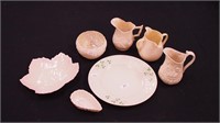 Seven pieces of Belleek china including three