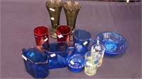 11 pieces of colored glass including Shirley