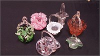 Seven small art glass pieces including six baskets
