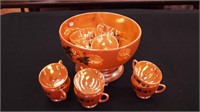 A lusterware punch set with two-piece punchbowl