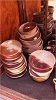 27 pieces of artisan pottery, mostly bowls and