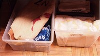 Two containers of fabric including