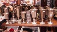 29 pieces of pewter: goblets, napkin rings