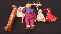 Four items: a wooden marionette,