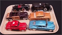 Six die-cast replica cars including three by