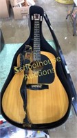 Gremlin G-60 well loved acoustic guitar with case