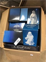 Box of Assorted Avon Christmas figures.