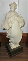 Woman with arms crossed abstract sculpture on