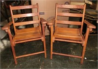 pair of child size folding deck chairs