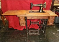 Singer treadle sewing machine with ornate iron