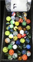 (F) 50 assorted marbles