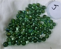jar of cats eye type machine made marbles