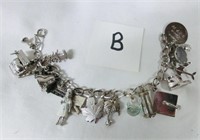 lot b sterling charm bracelet with 17 charms