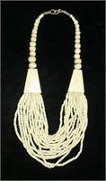 carved bone beaded necklace