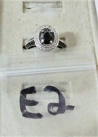 ornate cut work sterling ring with black stones