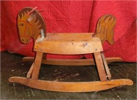 Wood rocking horse with stenciled decoration