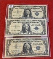 Three 1957 $1 silver certificates