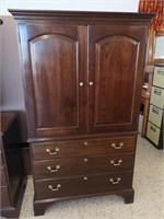 Beautiful wooden Stickley furniture armoire