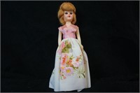Doll with Pink and White Dress