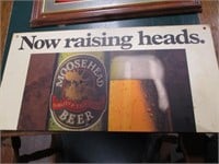Moosehead beer"Now raising Heads"