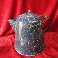 Blue graniteware speckled coffee pot.