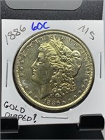 1886 MORGAN SILVER DOLLAR GOLD DIPPED?