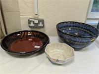 Three art pottery bowls