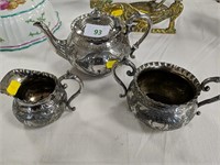 Three piece silver plated tea service.