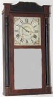 Two panel column wall clock with turned half