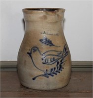 Bluebird decorated stoneware pitcher - signed