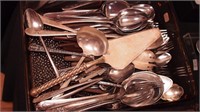 Group of silverplate flatware with serving pieces