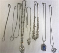 8 Silvertoned Necklaces